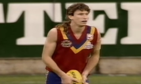 South Australia's Paul Bulluss - business at the front, party at the back