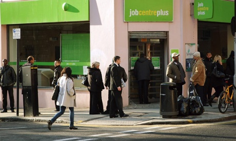 People queue outside a branch of the Job Centre Plus 