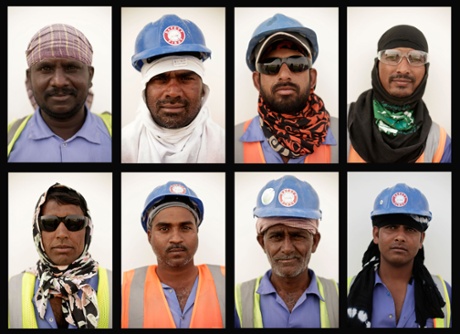Labourers pose for a portrait at a workers' camp in Doha, Qatar.