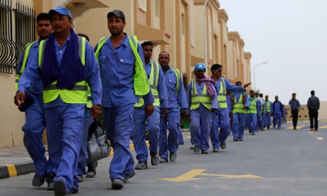Foreign labourers building al-Wakrah football stadium.