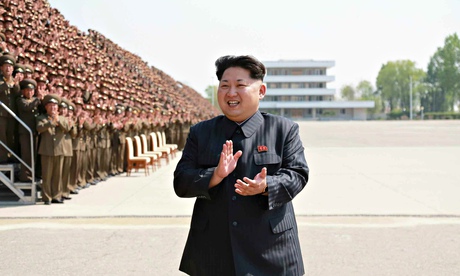 North Korean leader Kim Jong-un at a photo session with a group of training officers.