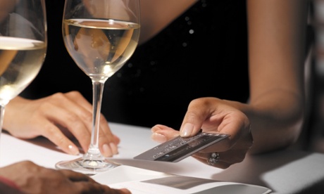 Woman paying for dinner shock