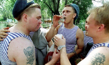 three russian paratroopers drinking vodka