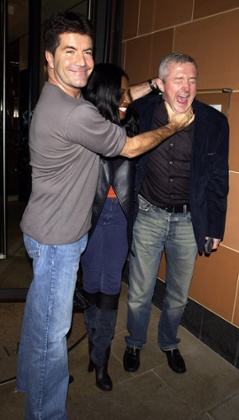 Simon Cowell (in his dad jeans) with Sinitta and Louis Walsh in 2005.
