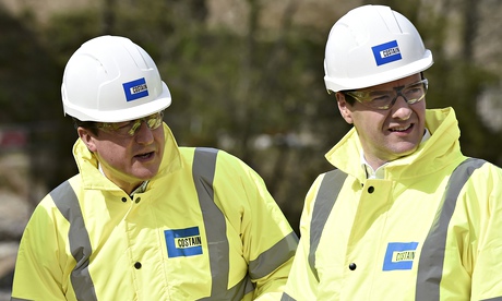 David Cameron and George Osborne in traditional Conservative outfits. Photograph: Toby Melville/Reut