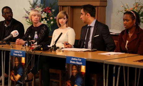 Solicitor Aamer Anwar (second from right) with the family of Sheku Bayoh, including his partner Colette Bell (centre) and his sister Kadijartu Johnson (right), at a news conference in Edinburgh.