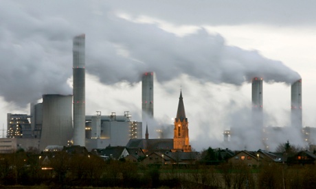 The village of Gusdorf, west of Cologne in Germany, is pictured in front of the lignite-fired power plant