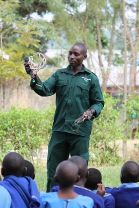 Paul Mugisha talking with Kasiisi Wildlife Club members about snaring.