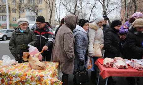 Women queue  in a market in Sovetov square, Kemerovo, Russia