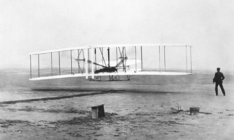 Orville Wright is at the controls of the Wright Flyer during the plane's first flight at Kitty Hawk, N.C. on Dec. 17, 1903