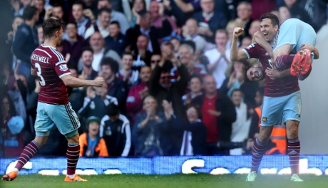Then celebrates with a fireman’s lift on Carl Jenkinson.