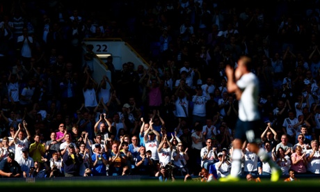 Spurs fans applaud Harry Kane as he reciprocates the applause.