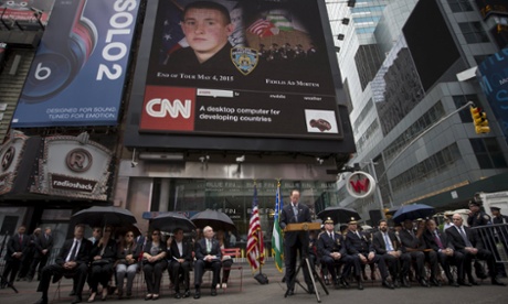 A memorial in Times Square for NYPD officer Brian Moore, killed on duty in May 2015.