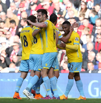 Jason Puncheon, right, is congratulated by his Crystal Palace team-mates after he scored the equaliser.