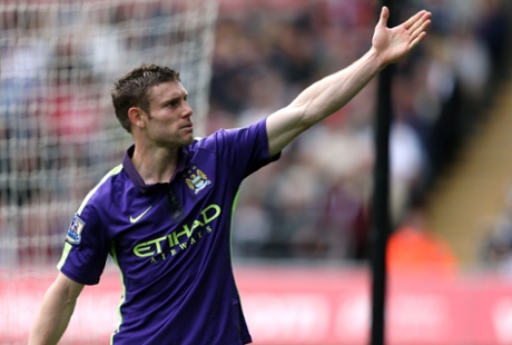 James Milner celebrates scoring City's second.
