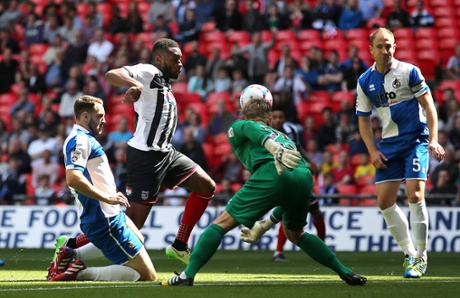Lenell John Lewis scores the first goal.