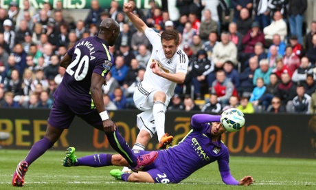 Gylfi Sigurdsson of Swansea City scores.