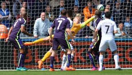 Joe Hart makes the save.