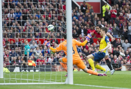 Radamel Falcao has a shot blocked by David Ospina.