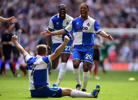 Angelo Balanta runs to celebrate with Lee Mansell  after scoring the winning penalty in the shoot out.