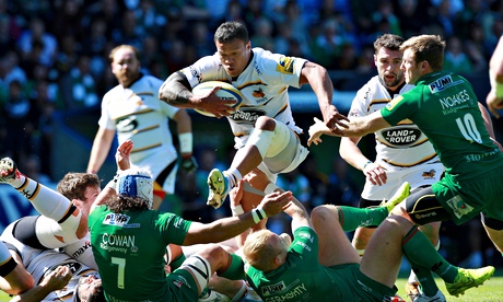 Alapati Leiua of Wasps tries to vault over the London Irish defence
