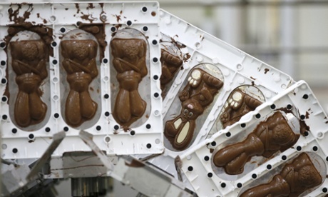 Chocolate easter bunnies come off the production line at the Thorntons factory in Alfreton, Derbyshire.