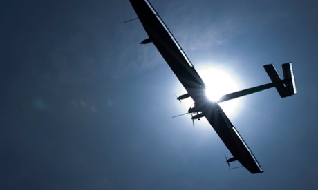 German test pilot Markus Scherdel steers the solar-powered Solar Impulse HB-SIA prototype airplane during his first flight over Payerne April 7, 2010.