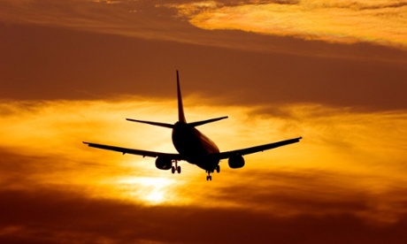 Plane flies into the sunset