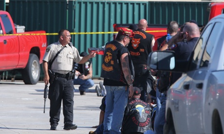 Authorities investigate a shooting in the parking lot of the Twin Peaks restaurant in Waco, Texas.