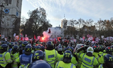 Police clash with demonstrators in Parliament Square during tuition fee protests in December 2010.