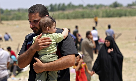 Displaced Iraqis from Ramadi flee their hometown after it was seized by Isis.