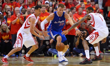 Los Angeles Clippers player Blake Griffin loses the ball against Houston Rockets players