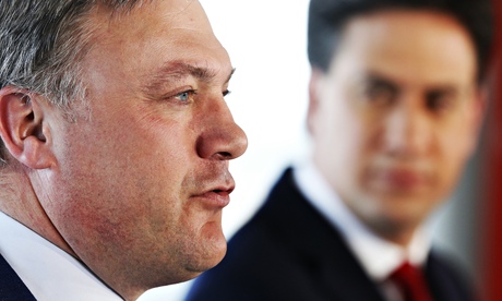 Miliband looks on as Ed Balls upstages him again.