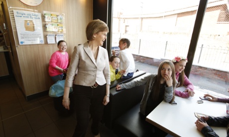Nicola Sturgeon at a shopping centre in Glasgow. She would immediately abolish the 'bedroom tax' and oppose plans to further cut benefits.