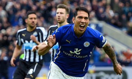 Leonardo Ulloa of Leicester City celebrates scoring his team's third goal from the penalty spot.