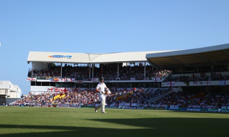 Jonathan Trott of England makes his way back to the pavillion after being dismissed for 9 runs by Jerome Taylor.