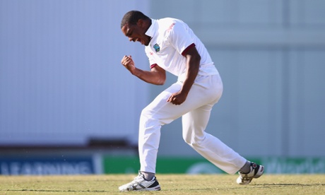 Shannon Gabriel celebrates taking the wicket of Alastair Cook.