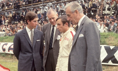 Prince Charles and Lord Mountbatten (far right) meet driver Jackie Stewart at the British Grand Prix at Brands Hatch, 1968.