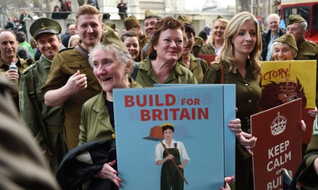 Demonstrators wearing WWII uniforms protest at a Homes for Britain rally in London