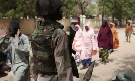 Nigerian soldiers at a checkpoint in Gwoza, a town newly liberated from Boko Haram.