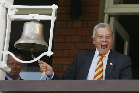 Former umpire Dickie Bird rings the bell.