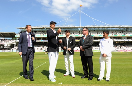 Alastair Cook toss the coin alongside Brendon McCullum.