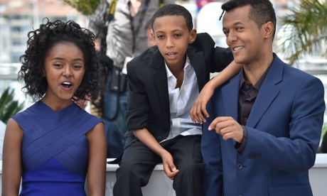 Actors Kidist Siyum and Rediat Amare, and director Yared Zeleke at the premiere for Lamb at the 68th Cannes Film Festival.