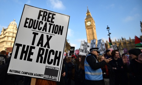 Students protest outside the Houses of Parliament during a march against university fees in London in 2014.