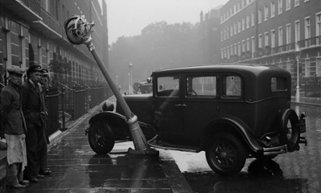 A car which has crashed into a lamppost, 1930