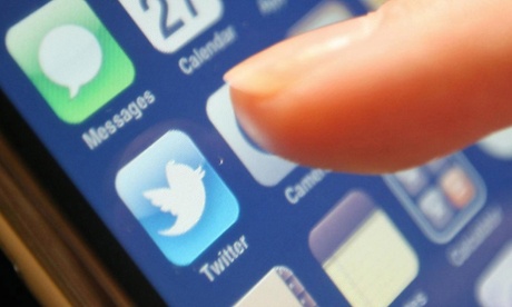 Person using the Twitter app on a smartphone