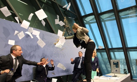 Protester disrupts ECB press conference after its monthly meeting.