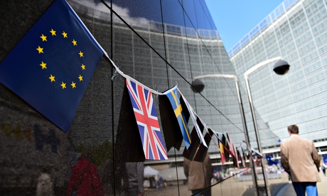 An European flag and a British flag 