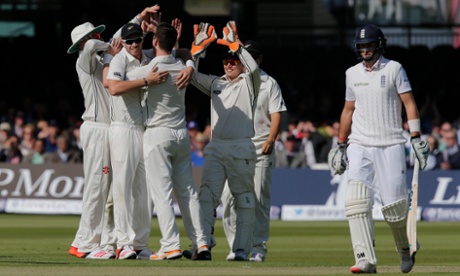 New Zealand celebrate getting Joe Root out for 98 as the England batsman trudges back to the pavillion.