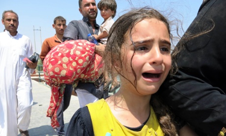 A girl flees from Ramadi with her family as Isis seized control of the town. The Obama administration is reportedly taking 'an extremely hard look' at its approach in the wake of the setback.